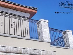 exterior-railing-forged-fleur-de-lise-and-decorative-tops calgary