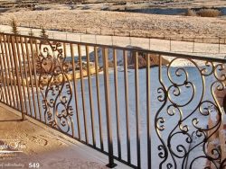 steel-railing-with-scroll-panels calgary