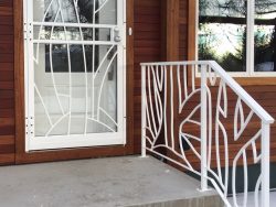 tree-themed-security-door-and-railing